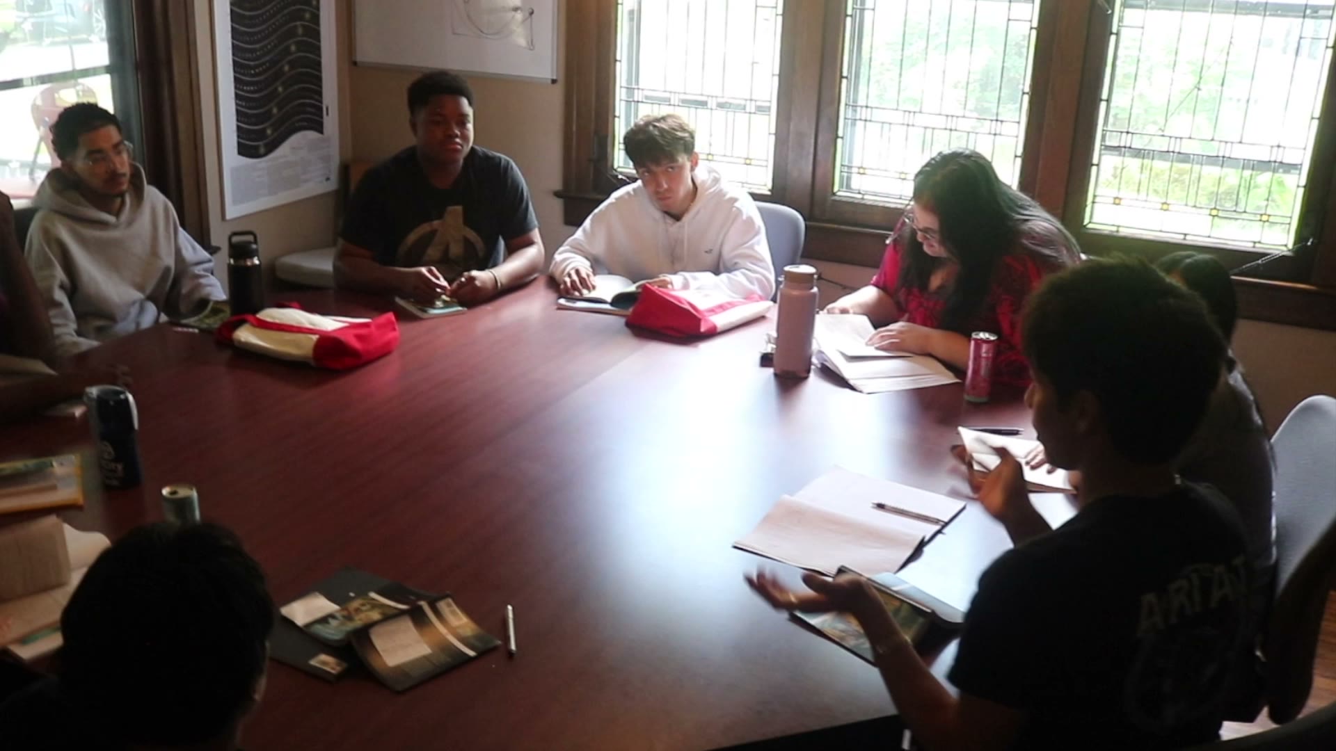 Students and a professor participating in a Shimer seminar